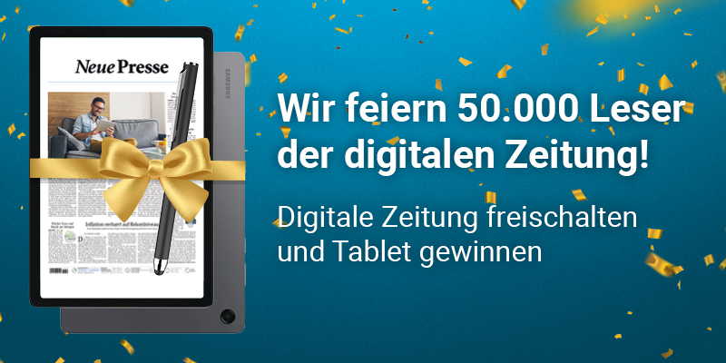 Tablet displaying a newspaper with a gold ribbon, celebrating 50,000 digital newspaper readers.